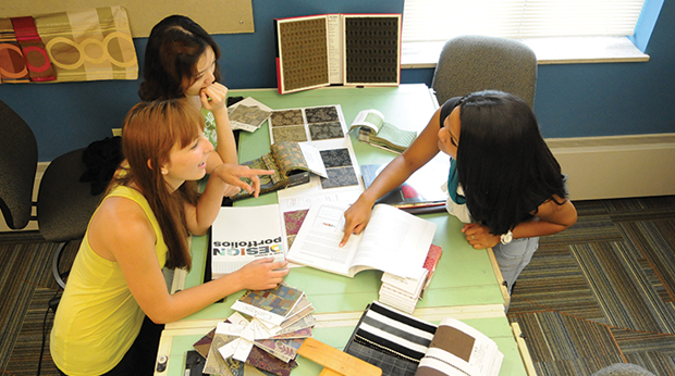 La Roche interior design students at design table